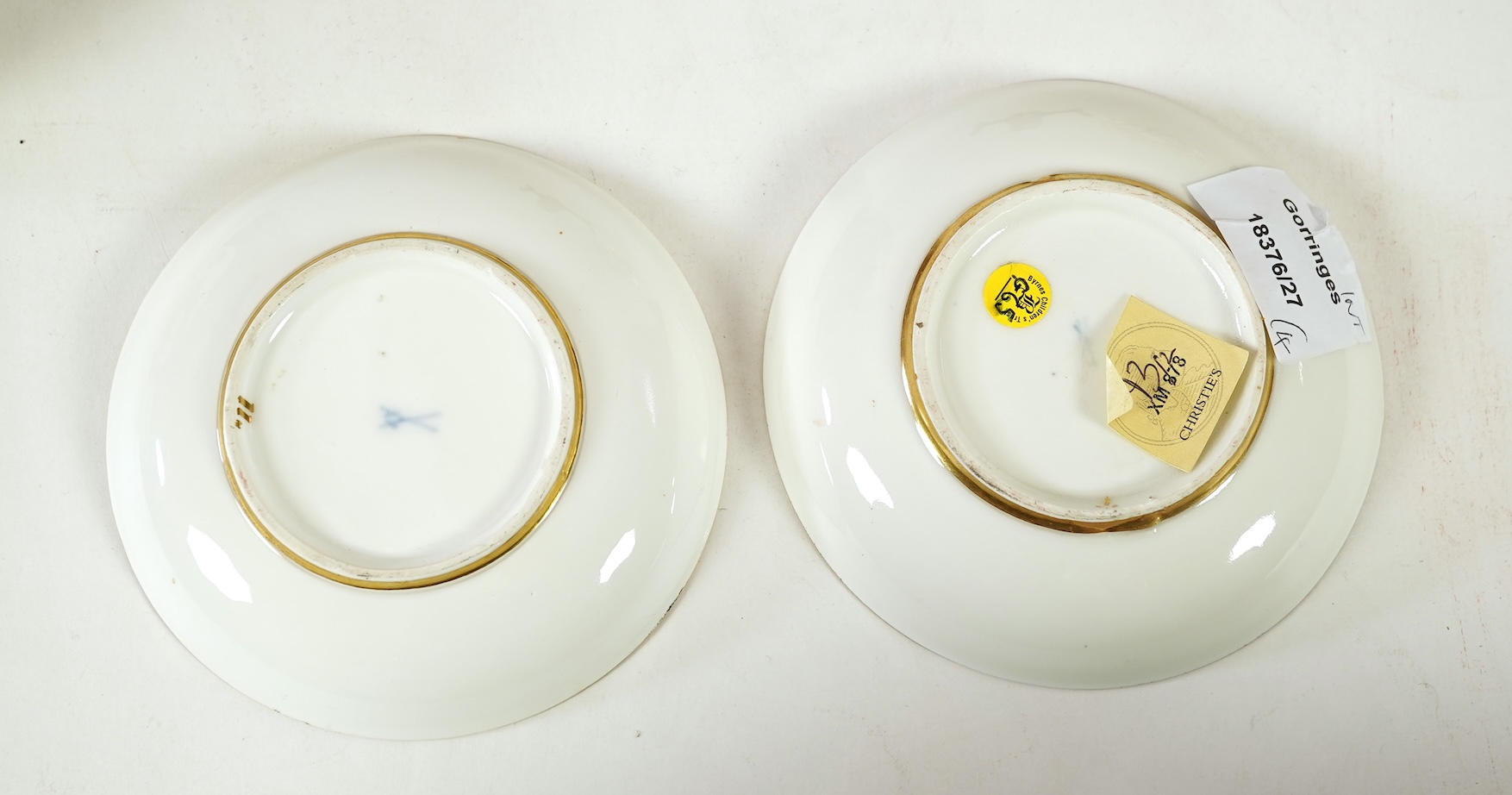 A Meissen cup and saucer, similar tea bowl and two saucers, c.1735-45